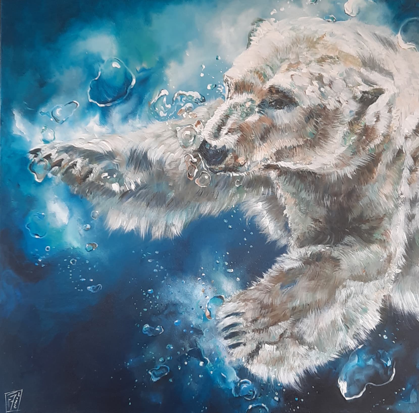 BLEU INTENSE. Un ours polaire qui nage sous l'eau