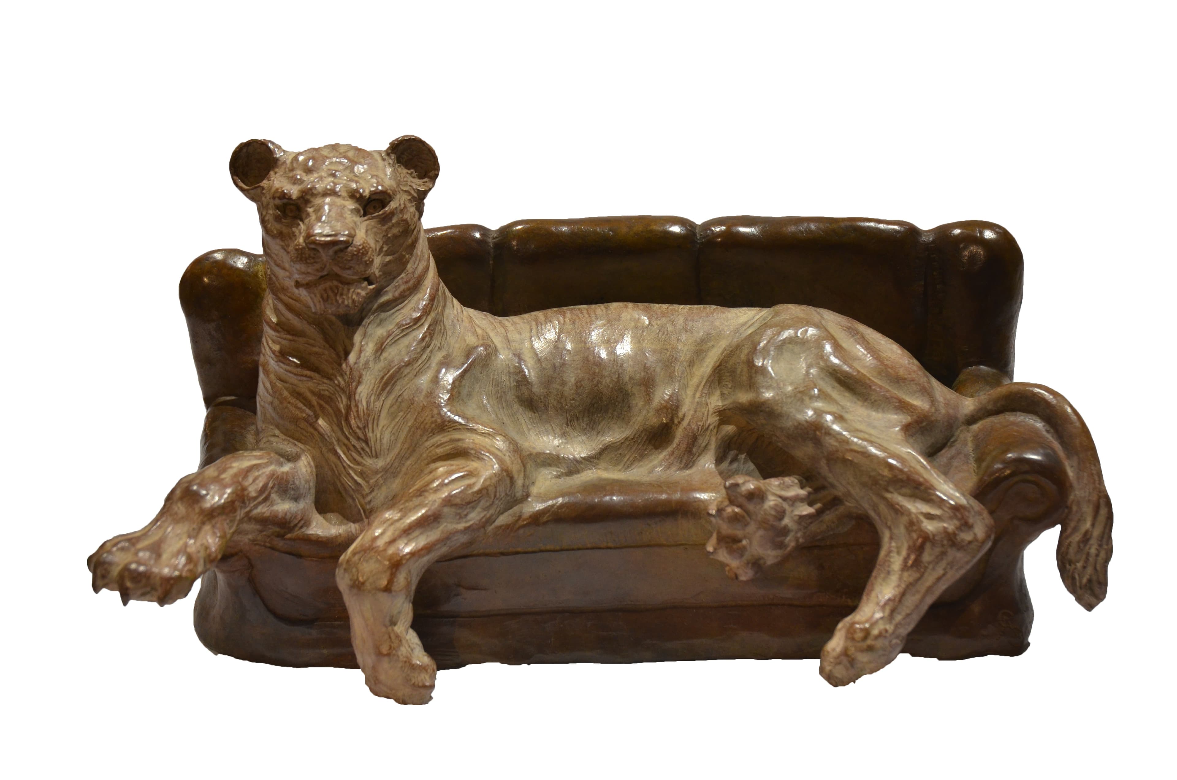 LIONNE SUR CANAPE